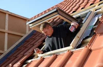 Pose de fenêtres de toit Velux à Luze